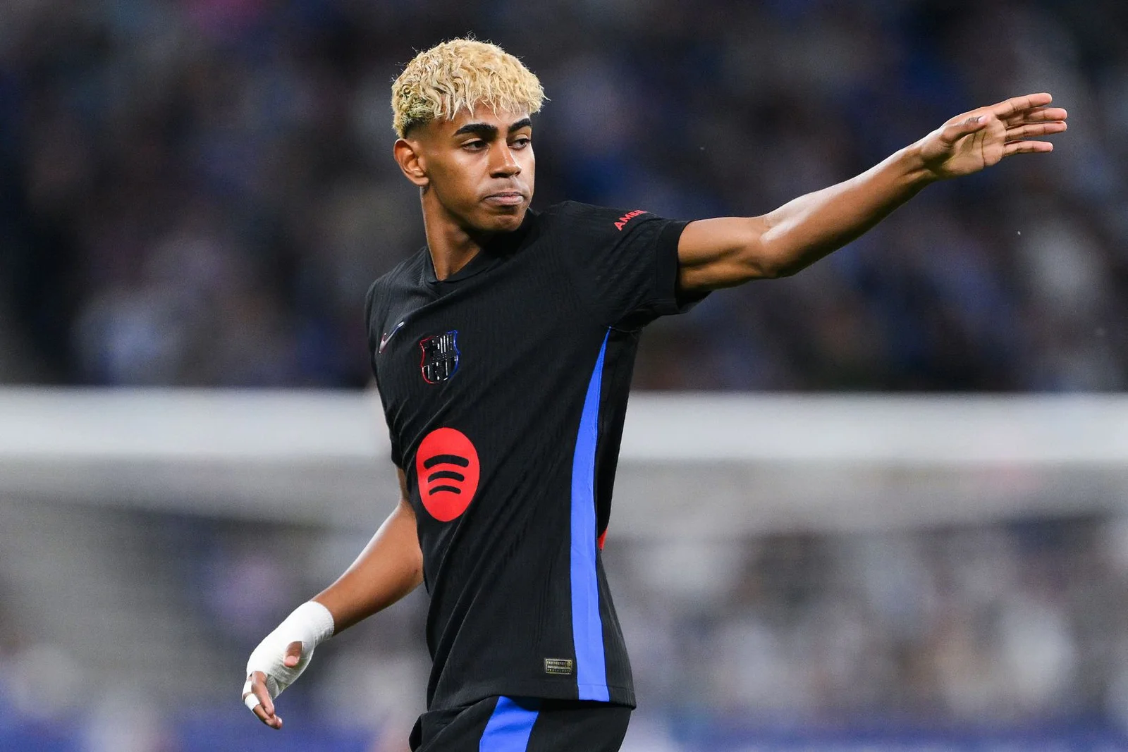 BARCELONA, SPAIN - MAY 14: Lamine Yamal of FC Barcelona looks on during the LaLiga match between RCD Espanyol de Barcelona and FC Barcelona at RCDE Stadium on May 14, 2025 in Barcelona, Spain.