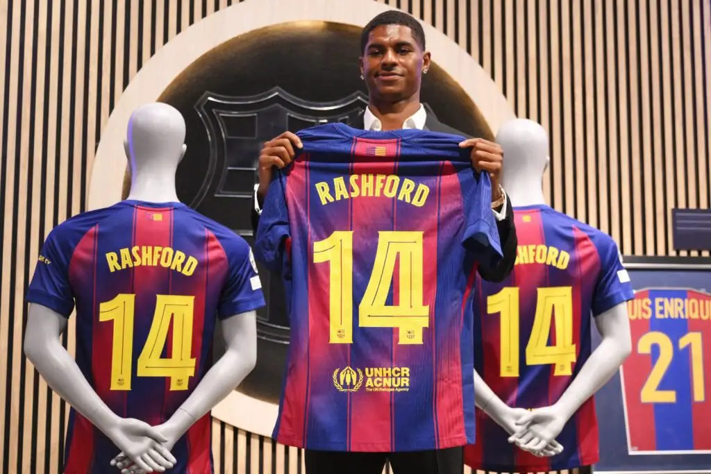 BARCELONA, SPAIN - JULY 23: Marcus Rashford of FC Barcelona holds up his shirt during the Unveiling of New Signing Marcus Rashford, after the announcement of a season-long loan move from Manchester United to FC Barcelona, at Camp Nou on July 23, 2025 in Barcelona, Spain.