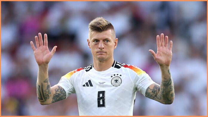 STUTTGART, GERMANY - JULY 05: Toni Kroos of Germany acknowledges the fans after the team's defeat in the UEFA EURO 2024 quarter-final match between Spain and Germany at Stuttgart Arena on July 05, 2024 in Stuttgart, Germany.